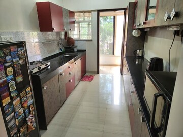 Kitchen in 2 BHK Apartment at Kolte Patil Aleria, Kharadi – for Rent