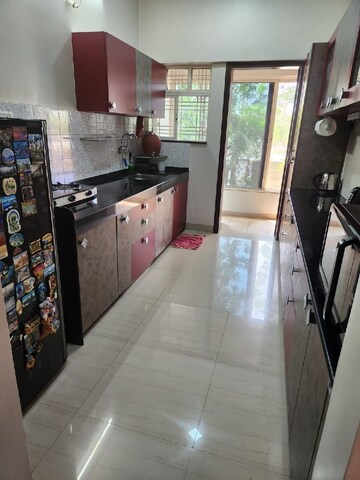 Kitchen in 2 BHK Apartment at Kolte Patil Aleria, Kharadi – for Rent