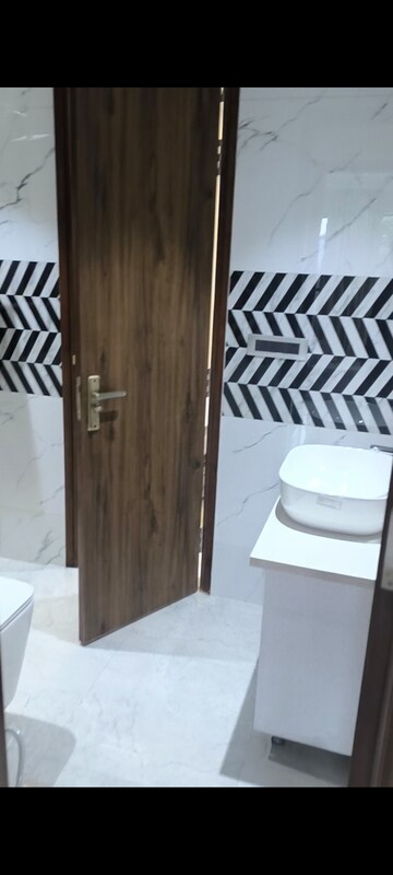 Bathroom in 4 BHK Builder Floor at Ansal API Esencia, Sector 67 – for Sale