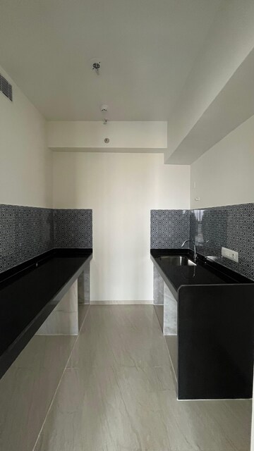 Kitchen in 2 BHK Apartment at Lodha Crown Quality Homes, Majiwada – for Sale