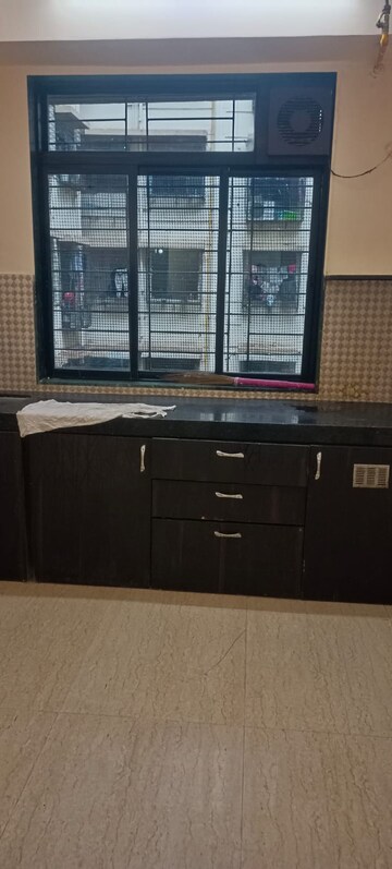 Kitchen in 1 BHK Apartment at Kshitija Shree Laxmi Residency, Byculla West – for Rent