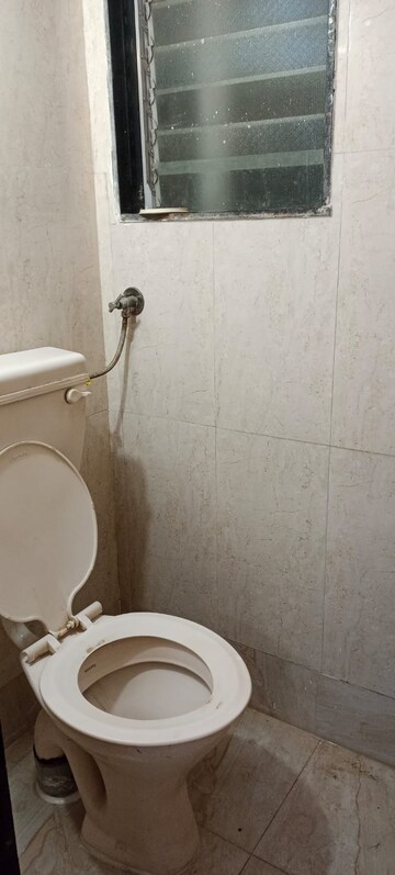 Bathroom in 1 BHK Apartment at Kshitija Shree Laxmi Residency, Byculla West – for Rent