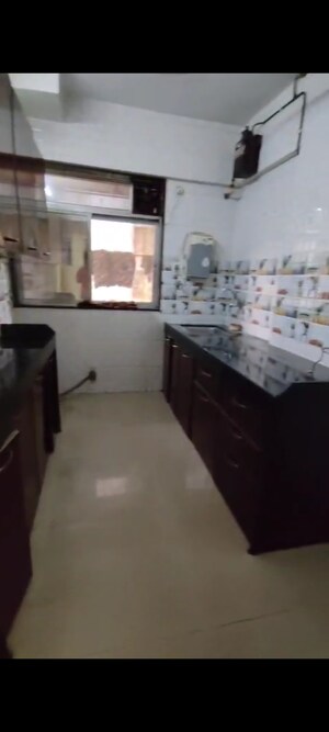 Kitchen in 1 BHK Apartment at Suvidha Jewel, Mulund East – for Sale