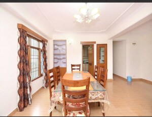 Living Room in 4 BHK Apartment at Vikasnagar – for Sale