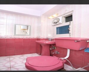 Bathroom in 4 BHK Apartment at Vikasnagar – for Sale