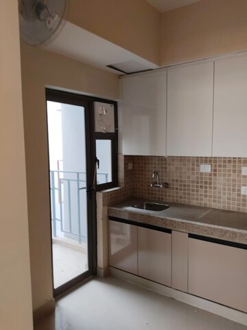 Kitchen in 2 BHK Apartment at Paras Dews, Sector 106 – for Rent