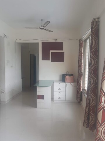 Living Room in 1 BHK Apartment at Vanaz Corner, Kothrud – for Rent
