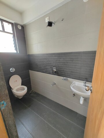Bathroom in 3 BHK Apartment at Swaraaj Heights, Punawale – for Rent