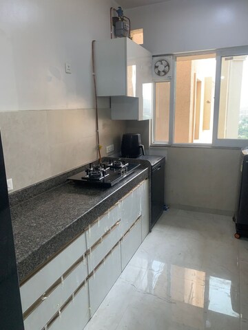 Kitchen in 2 BHK Apartment at Sunshree Woods, Nibm Road – for Rent