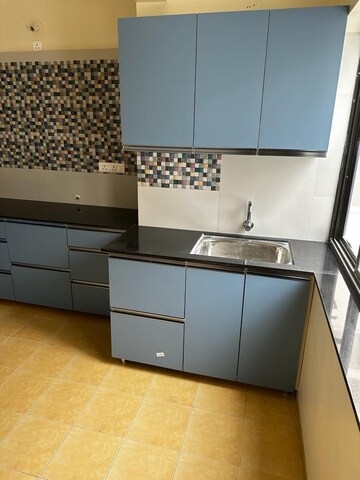 Kitchen in 2 BHK Apartment at Sunshree Woods, Nibm Road – for Rent
