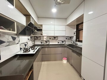 Kitchen in 4 BHK Apartment at Rodas Enclave Evergreen, Patlipada – for Rent