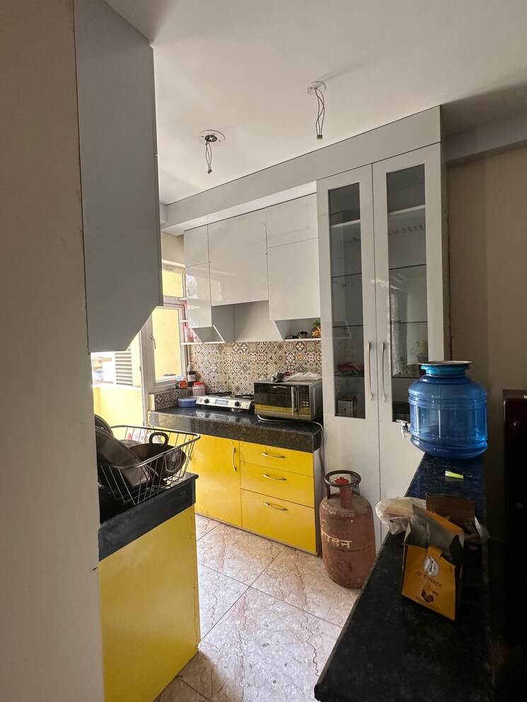 Kitchen, aditya-world-city 2 Bedroom 858 Sq.Ft. Apartment In Shahpur Bamheta Ghaziabad 8866643