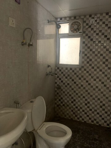 Bathroom in 2 BHK Apartment at Wave Dream Homes, Wave City – for Rent