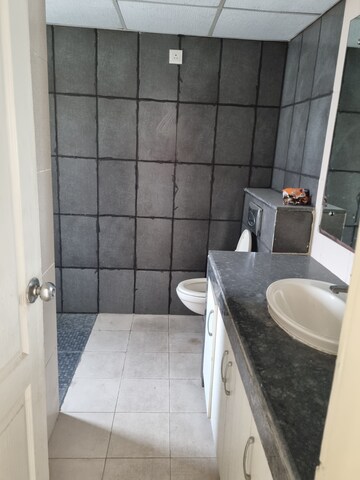 Bathroom in 3 BHK Apartment at Raheja Vedaanta, Sector 108 – for Rent