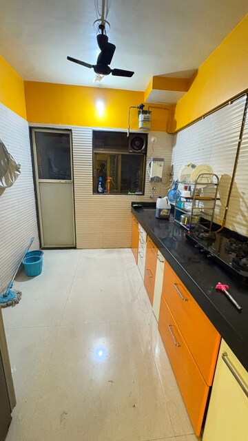 Kitchen in 2 BHK Apartment at Cosmos Jewels, Ghodbunder Road – for Rent