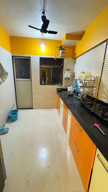 Kitchen in 2 BHK Apartment at Cosmos Jewels, Ghodbunder Road – for Rent