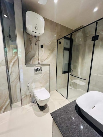 Bathroom in 4 BHK Apartment at Mahagun Mezzaria, Sector 78 – for Rent