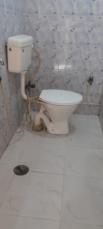 Bathroom in 3 BHK Apartment at Himgiri Apartments, Govindpuri – for Rent
