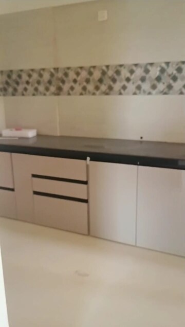 Kitchen in 2 BHK Apartment at Bhakti Elysia Apartments, Wakad – for Rent