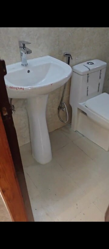 Bathroom in 2 BHK Apartment at SG Shikhar Height, Siddharth Vihar – for Rent