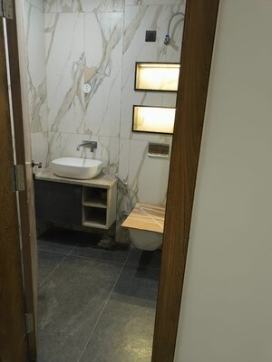 Bathroom in 4 BHK Builder Floor at Sector 49 – for Sale