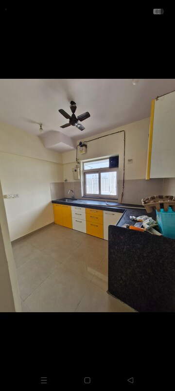 Kitchen in 2 BHK Apartment at Kamal Apartment Teen Hath Naka, Louis Wadi – for Rent