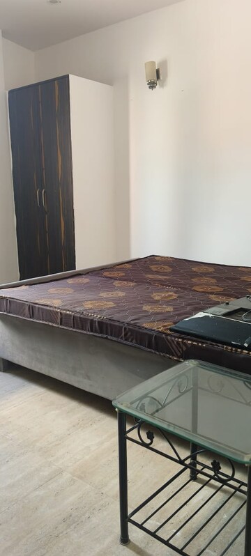 Bedroom in 1 BHK Builder Floor at Sushant Lok I – for Rent