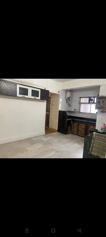 Kitchen in 2 BHK Apartment at Kamal Apartment Teen Hath Naka, Louis Wadi – for Rent