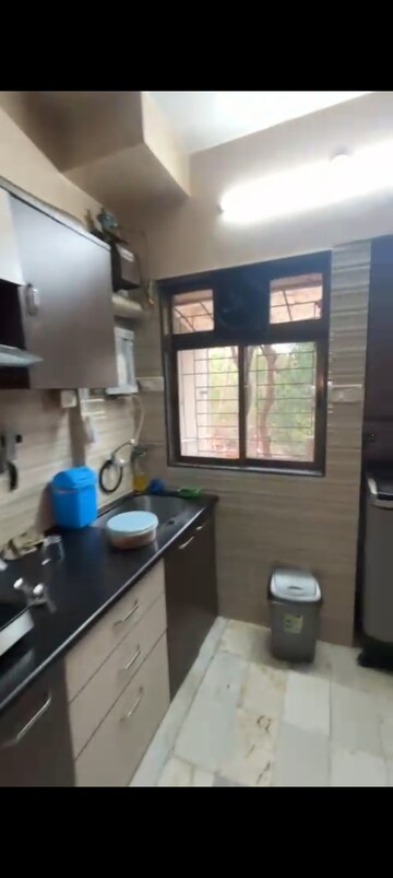 Kitchen in 2 BHK Apartment at Sahayog Complex, Manpada – for Rent