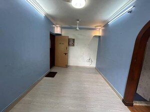 Living Room in 1 BHK Apartment at Raj Shiv CHS, Dahisar East – for Sale