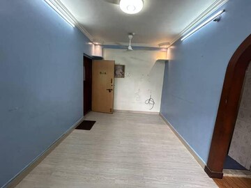 Living Room in 1 BHK Apartment at Raj Shiv CHS, Dahisar East – for Sale