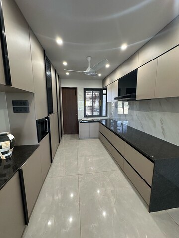 Kitchen in 4 BHK Apartment at Strut Arcadia 77, Gota – for Sale