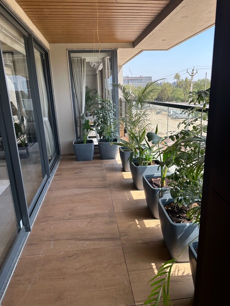 Balcony, strut-arcadia-77 4 Bedroom 425 Sq.Yd. Apartment In Gota Ahmedabad 8867221