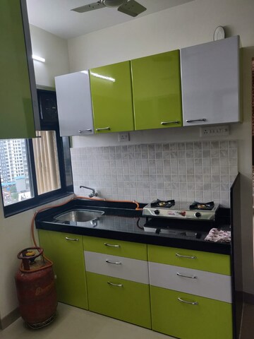 Kitchen in 1 BHK Apartment at Raj Residency Kasarvadavali, Kasarvadavali – for Rent
