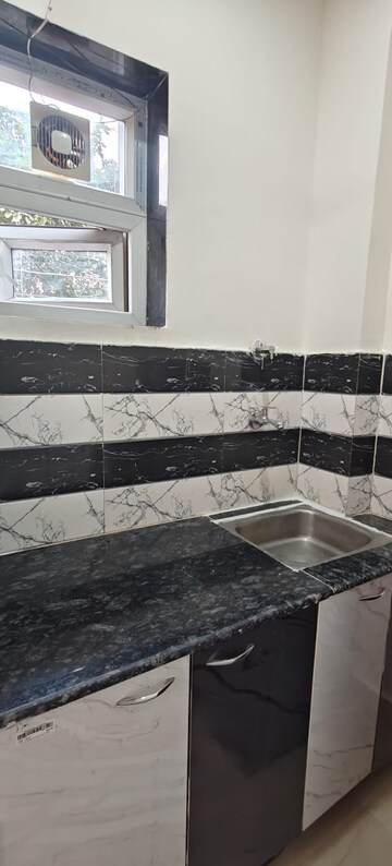 Kitchen in 1 RK Builder Floor at Sushant Lok I – for Rent