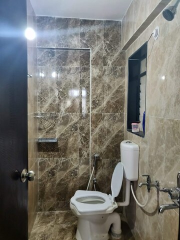 Bathroom in 1 BHK Apartment at Raj Residency Kasarvadavali, Kasarvadavali – for Rent