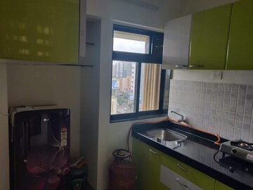 Kitchen in 1 BHK Apartment at Raj Residency Kasarvadavali, Kasarvadavali – for Rent