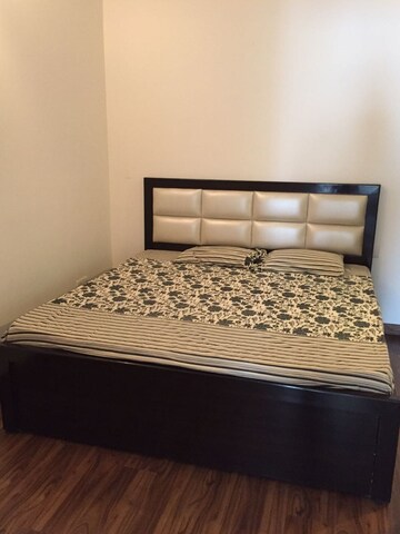 Bedroom in 3.5 BHK Apartment at Emaar The Palm Drive-Palm Studios, Sector 66 – for Rent