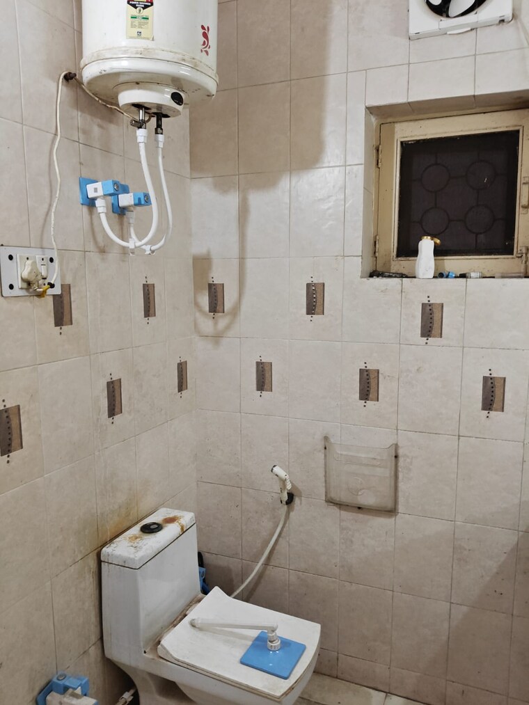 Bathroom, sector 49 5 Bedroom 153 Sq.Mt. Independent House In Sector 49 Noida 8867564