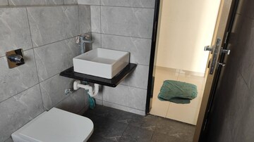 Bathroom in 1 BHK Apartment at Paranjape Blue Ridge, Hinjewadi – for Rent