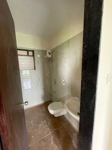 Bathroom in 2 BHK Apartment at Raunak City Sector 4 D3, Kalyan West – for Rent