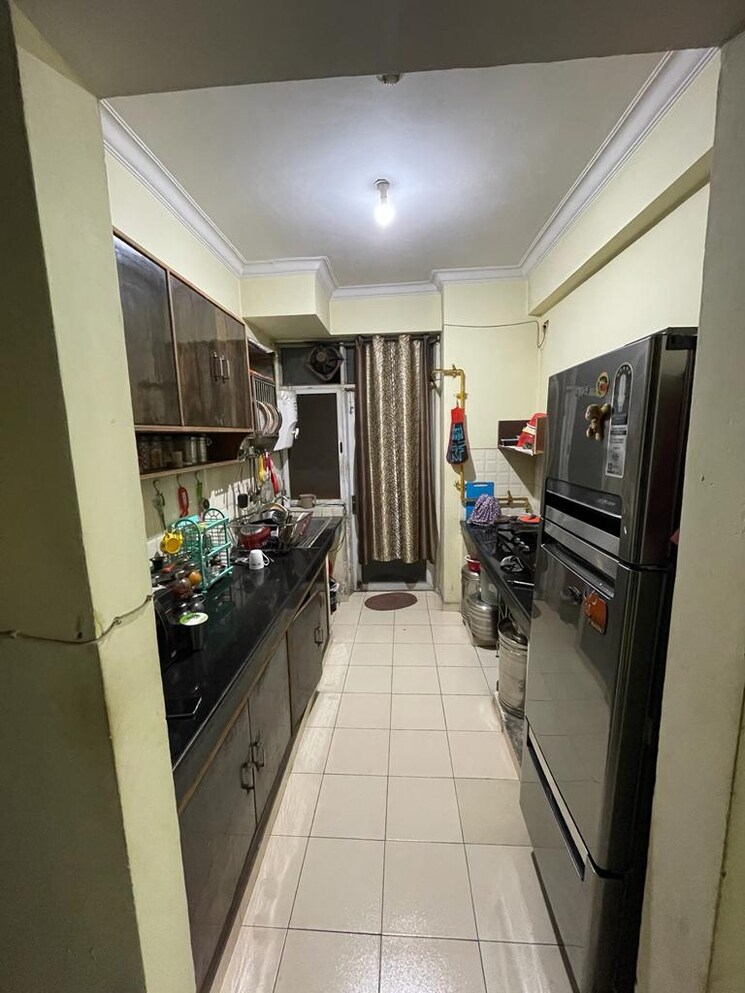 Kitchen, assotech-the-nest 2 Bedroom 1100 Sq.Ft. Apartment In Sain Vihar Ghaziabad 8868023