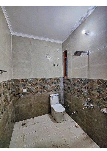 Bathroom in 3.5 BHK Builder Floor at Sahastradhara Road – for Rent