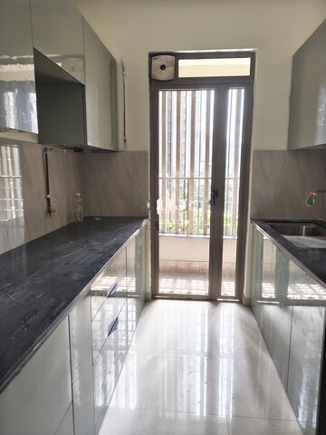 Kitchen in 2 BHK Apartment at Kalpataru Paramount, Kapur Bawdi – for Rent