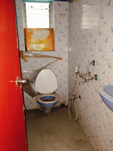 Bathroom in 3 BHK Apartment at Golaghata – for Sale