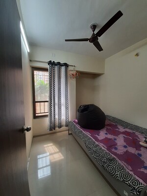 Living Room in 2 BHK Apartment at Rustomjee Virar Avenue L1 L2 And L4 Wing H, Virar West – for Sale