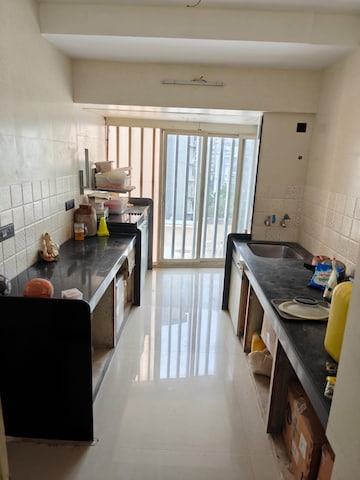 Kitchen in 1 BHK Apartment at Philjoy CHS, Borivali West – for Sale