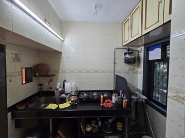Kitchen in 1 BHK Apartment at MG Complex, Vashi Sector 11 – for Rent