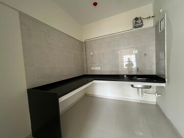 Kitchen in 2 BHK Apartment at Paranjape Forest Trails The Cove, Bhugaon – for Rent