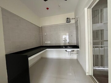 Kitchen in 2 BHK Apartment at Paranjape Forest Trails The Cove, Bhugaon – for Rent